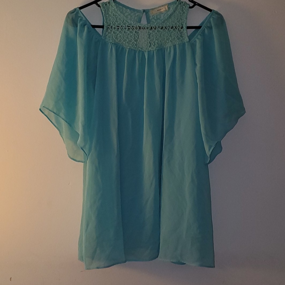 Light blue flowy blouse with lace detail